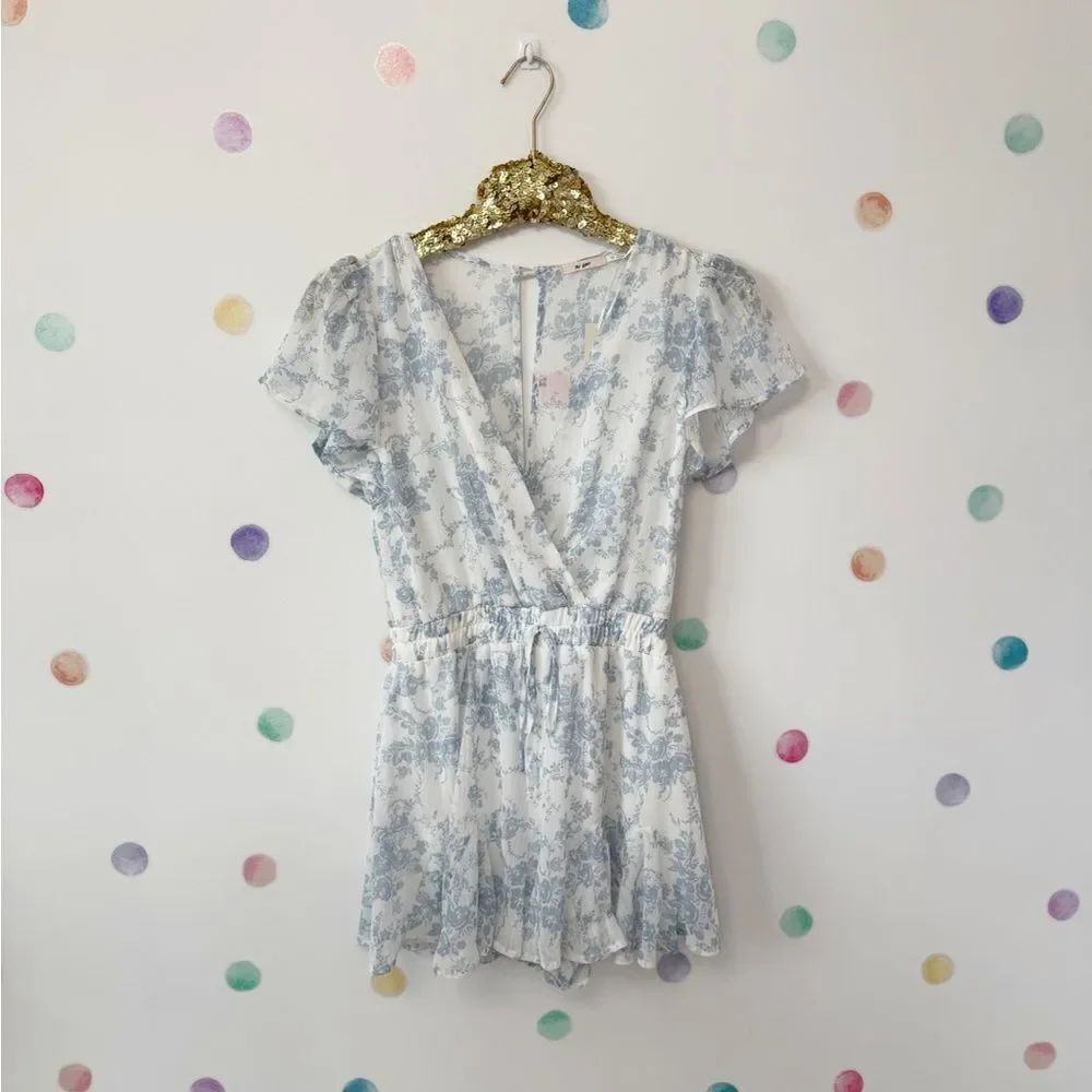 Francesca's Collections Blue and White Floral Romper